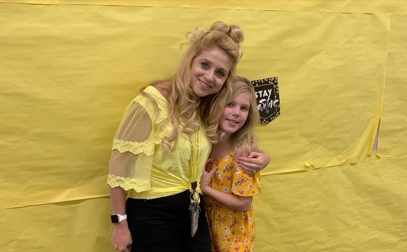  Michelle Will with an Elmcrest Elementary student